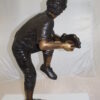 Boy plays baseball Bronze Statue -  Size: 22"L x 12"W x 36"H.