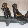 Two kids with dog on log Bronze Statue -  Size: 12"L x 5"W x 8.5"H.