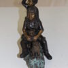 Two kids with dog on log Bronze Statue -  Size: 12"L x 5"W x 8.5"H.