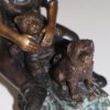 Two kids with dog on log Bronze Statue -  Size: 12"L x 5"W x 8.5"H.