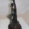 Girl on a swing Bronze Statue -  Size: 15"L x 8"W x 21"H.