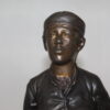 Boy standing Bronze Statue -  Size: 7.5"L x 7.5"W x 23.5"H.