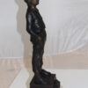 Boy standing Bronze Statue -  Size: 7.5"L x 7.5"W x 23.5"H.