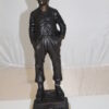 Boy standing Bronze Statue -  Size: 7.5"L x 7.5"W x 23.5"H.