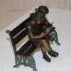 Two kids on bench reading a book - Bronze Statue -  Size: 9"L x 6"W x 8"H.