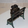 Two kids on bench reading a book - Bronze Statue -  Size: 9"L x 6"W x 8"H.