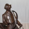 Hunting man on horse Bronze Statue -  Size: 16"L x 8"W x 14"H.