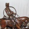 Hunting man on horse Bronze Statue -  Size: 16"L x 8"W x 14"H.