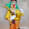 Clown Standing with Saxophone Bronze Statue -  Size: 20"L x 15"W x 36"H.