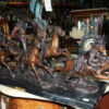 War party Bronze Statue by Carl Cauba -  Size: 39"L x 10"W x 15"H.