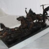 War party Bronze Statue by Carl Cauba -  Size: 39"L x 10"W x 15"H.