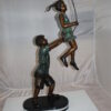 Children-on-swing-Bronze-Statue -  Size: 20"L x 9"W x 39"H.