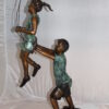 Children-on-swing-Bronze-Statue -  Size: 20"L x 9"W x 39"H.