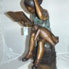 Girl sitting on a stack of books reading a book Bronze Statue -  17"x 18"x 36"H