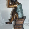 Girl sitting on a stack of books reading a book Bronze Statue -  17"x 18"x 36"H