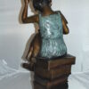 Girl sitting on a stack of books reading a book Bronze Statue -  17"x 18"x 36"H