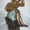 Girl sitting on a stack of books reading a book Bronze Statue -  17"x 18"x 36"H