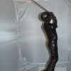 Teen boy plays golf Bronze Statue -  Size: 18"L x 13"W x 57"H.