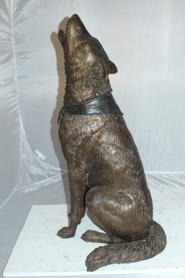 Howling Wolf Bronze Statue -  Size: 16"L x 20"W x 37"H.
