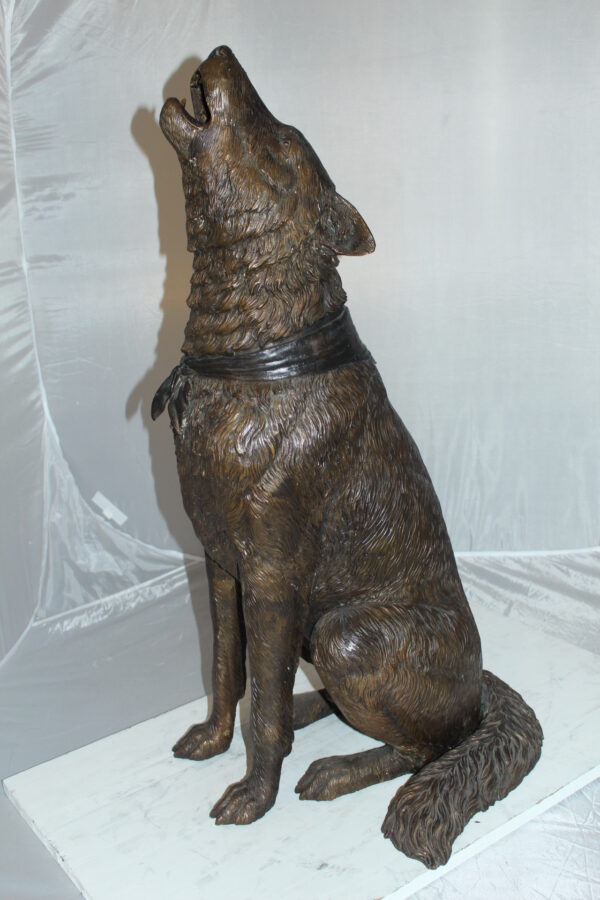 Howling Wolf Bronze Statue -  Size: 16"L x 20"W x 37"H.