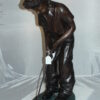 Boy plays golf Bronze Statue -  Size: 14"L x 18"W x 37"H.