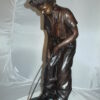 Boy plays golf Bronze Statue -  Size: 14"L x 18"W x 37"H.