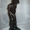 Boy plays golf Bronze Statue -  Size: 14"L x 18"W x 37"H.