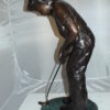 Boy plays golf Bronze Statue -  Size: 14"L x 18"W x 37"H.