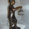 Caddy with light Bronze Statue -  Size: 19"L x 19"W x 42"H.