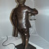 Caddy with light Bronze Statue -  Size: 19"L x 19"W x 42"H.