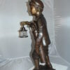 Caddy with light Bronze Statue -  Size: 19"L x 19"W x 42"H.