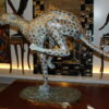 Running Cheetah - Gold Pleated Bronze Statue -  Size: 67"L x 23"W x 41"H.