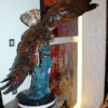 Eagle on a wave - Bronze Statue -  Size: 32"L x 12"W x 34"H.