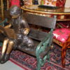 Girl sitting with her dog  on a bench,  reading Bronze Statue - 27" x 39" x 32"H