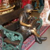 Girl sitting with her dog  on a bench,  reading Bronze Statue - 27" x 39" x 32"H