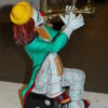 Clown Playing Instrument Bronze Statue -  Size: 12"L x 10"W x 20"H.