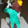 Clown Playing Instrument Bronze Statue -  Size: 12"L x 10"W x 20"H.