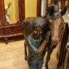 Young Girl and her pony Bronze Statue -  Size: 48"L x 20"W x 48"H.