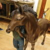 Young Girl and her pony Bronze Statue -  Size: 48"L x 20"W x 48"H.