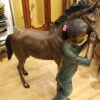 Young Girl and her pony Bronze Statue -  Size: 48"L x 20"W x 48"H.