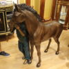 Young Girl and her pony Bronze Statue -  Size: 48"L x 20"W x 48"H.