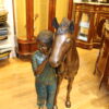 Young Girl and her pony Bronze Statue -  Size: 48"L x 20"W x 48"H.