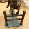 Jockey and Horse Jump a Fence Bronze Statue -  Size: 60"L x 30"W x 51"H.