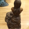 Lady on Stone Bronze Statue -  Size: 33"L x 23"W x 34"H.