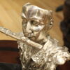 Man playing Flute Bronze Statue -  Size: 10"L x 8"W x 10"H.