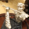 Man playing Flute Bronze Statue -  Size: 10"L x 8"W x 10"H.