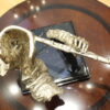 Man playing Flute Bronze Statue -  Size: 10"L x 8"W x 10"H.