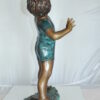 Boy with telescope Bronze Statue -  Size: 14"L x 10"W x 28"H.