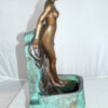 Lady on Wall fountain Bronze Statue -  Size: 12"L x 9"W x 21"H.