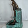 Lady on Wall fountain Bronze Statue -  Size: 12"L x 9"W x 21"H.